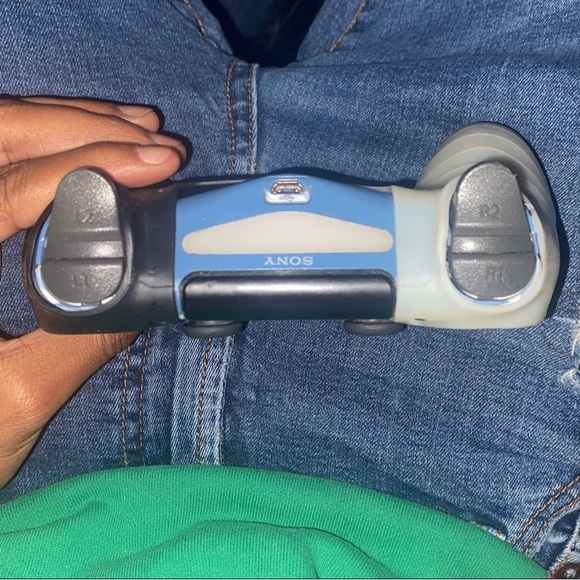 PLAYSTATION FULLY WORKING CONTROLLER WTH GRIP  BAND AROUND IT - Picture 2 of 3